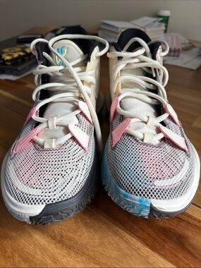 Nike Men's Multicolor Athletic Shoes — White, Pink, Blue, Black.